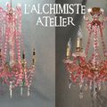 Restauration d'un lustre à pampilles roses en cristal taillé