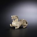 A rare jade carving of a chimera, bixie, Han Dynasty or later