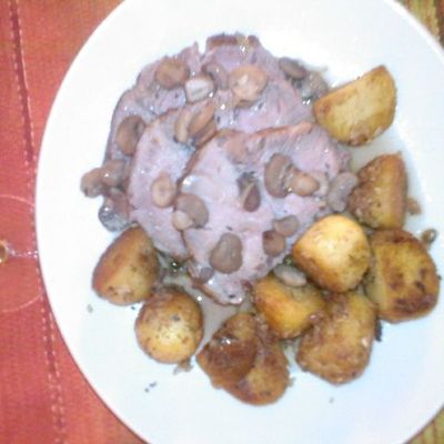 Roti de porc au vin blanc et champignons