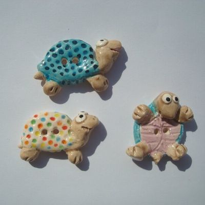 Boutons tortues, dauphins...
