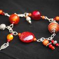 bracelet breloques rouge orange 16 euros