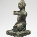 A very rare bronze figural support, Warring States period, 5th-3rd century BC