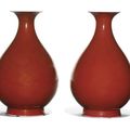 A pair of sang-de-boeuf glazed pear-shaped bottle vases, yuhuchunping, Tongzhi marks and period