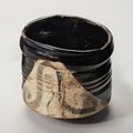 A Deep Teabowl with Dragon Design, named Noboriryu (rising dragon), Mino ware, Black Oribe type, Momoyama period, early 17th c