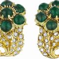 BUCCELLATI. A Unique Pair of Diamond and Emerald Earclips, 1970