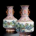 A superb pair of pink-ground famille-rose 'Landscape' vases, seal marks and of the period of Qianlong (1736-1795)