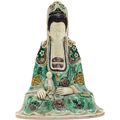 A biscuit-glazed seated Guanyin, Kangxi period (1662-1722) 