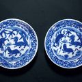 A pair of blue and white 'auspicious beasts' dishes, Wanli mark and period (1573-1620)