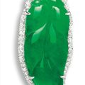 A Carved Type A Jadeite 'Leaf' and Diamond Pendant