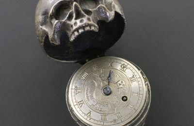 Pocket watch concealed in a memento mori