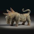 A painted gray pottery figure of a mythical beast, Han dynasty (206 BC - 220 AD)