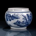 A blue and white cachepot with antiques, Kangxi period (1662-1722)