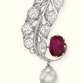 An Edwardian diamond, pearl and ruby brooch  