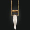 An emerald-inlaid and gem set gold push-dagger (katar), India, 18th century