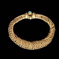 A fine turquoise-set gold wire Bracelet. Persia, 11th Century
