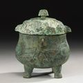 A Rare Archaic Bronze 'Double Owl' Ritual Food Vessel (you). Late Shang Dynasty, 13th-11th Century BC