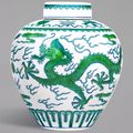 A green-enamelled 'dragon' jar and cover, Qianlong seal mark and period (1736-1795)