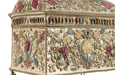 A Dutch embroidered, raised work and applique metal thread floral coffer, together with other accessories, first half 17th centu