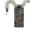 A mulitgem and silver pendant by Jean Boggio