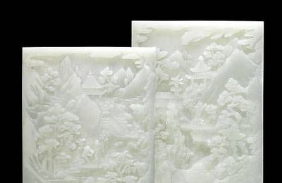 An important pair of white jade 'landscape' screens. Qianlong.