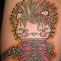 TATOUAGE HELLO KITTY EN MODE "Vash the Stampede"