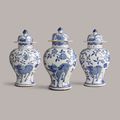 Three blue and white baluster vases and covers, Qing Dynasty, Kangxi Period (1662-1722)