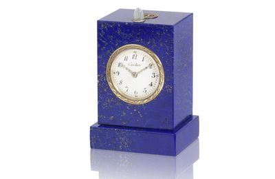 An Art-Deco Lapis lazuli, moonstone and diamond minute repeating desk clock, by Cartier, circa 1910