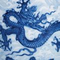 An extremely rare and superbly painted anhua-decorated blue and white ‘dragon’ stem bowl, Xuande mark and of the period