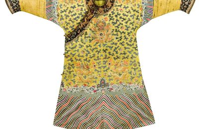An imperial embroidered yellow silk twelve-symbol dragon robe, Jifu, Qing Dynasty, Guangxu period (1875-1908)