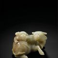 A celadon and russet jade boy and buffalo group, late 17th century