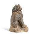 A limestone figure of a lion, Five Dynasties (907-960)