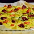 Tarte au chou-fleur et tomate garnie de magret de canard fumé