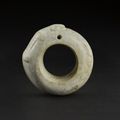A jade ring pendant, Possibly Neolithic period, circa 2000 BC