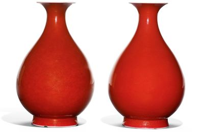 A pair of sang-de-boeuf glazed pear-shaped bottle vases, yuhuchunping, Tongzhi marks and period (1861-1875)