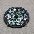 Bronze inlaid mother-of-pearl mirror with rosette design, Tang dynasty (618-907)