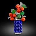 Art Deco lapis lazuli, emerald and carved corallium rubrum flower vase brooch by Cartier, Paris