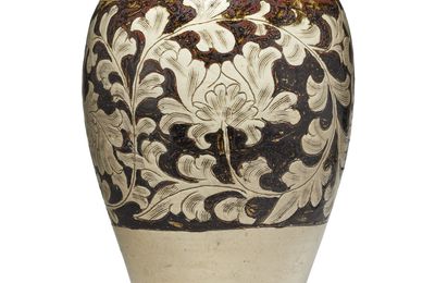 A carved Cizhou 'peony' vase, meiping, Jin dynasty, 12th  century or later