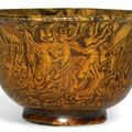 An amber-glazed marbled pottery cup, Tang dynasty (618-907)