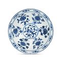 A rare blue and white 'fruit and flower' hexafoil bowl, Xuande six-character mark and of the period (1426-1435)
