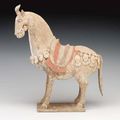 An Unusual Painted Grey Pottery Figure of a Caparisoned Horse, Northern Qi Dynasty (550-577)