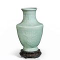 A celadon-glazed moulded vase, China, Qing dynasty (1644-1911)