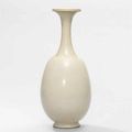 A very rare white-glazed bottle vase and cover, Tang dynasty (618-907)