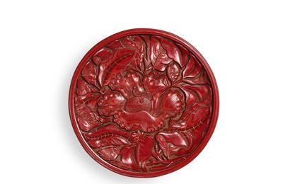 A carved cinnabar lacquer 'camellia' dish, Yuan dynasty