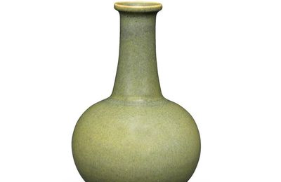 A rare teadust-glazed bottle vase, Qianlong seal mark and of the period (1736-1795)