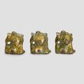 Three gilt-bronze and blue-glass-inlaid bear supports, Han dynasty (206 BC-220 AD)