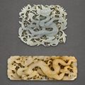 Two celadon jade reticulated 'dragon' plaques, Yuan-Ming Dynasty (1279-1644)