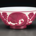 An unusual mauve-pink and reddish-pink overlay white glass bowl, 18th-19th century