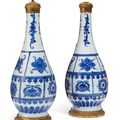 A pair of ormolu-mounted Chinese porcelain blue and white bottle vases