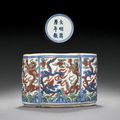 A late Ming wucai lobed 'dragon' box, Wanli six-character mark within double-circles and of the period (1573-1620)