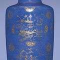 A gilt-decorated powder-blue ground rouleau vase, Kangxi period (1662-1722)